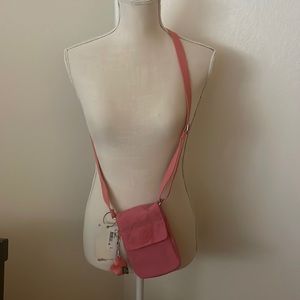 Kipling cross body bag 7 inches long 5 inches wide